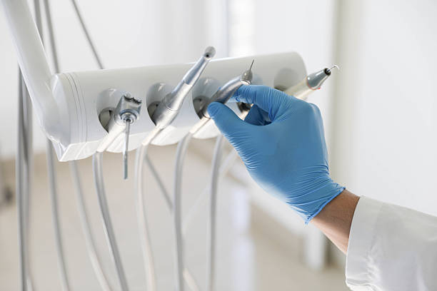 Professional Dental Crowns And Bridges technician working in East Moriches, NY
